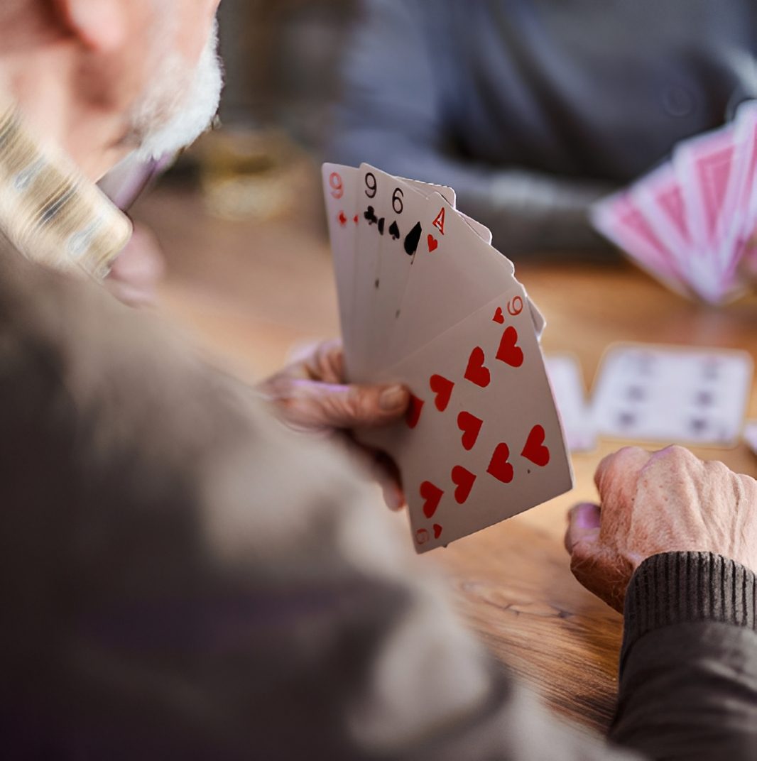 Close-up of hand holding playing cards